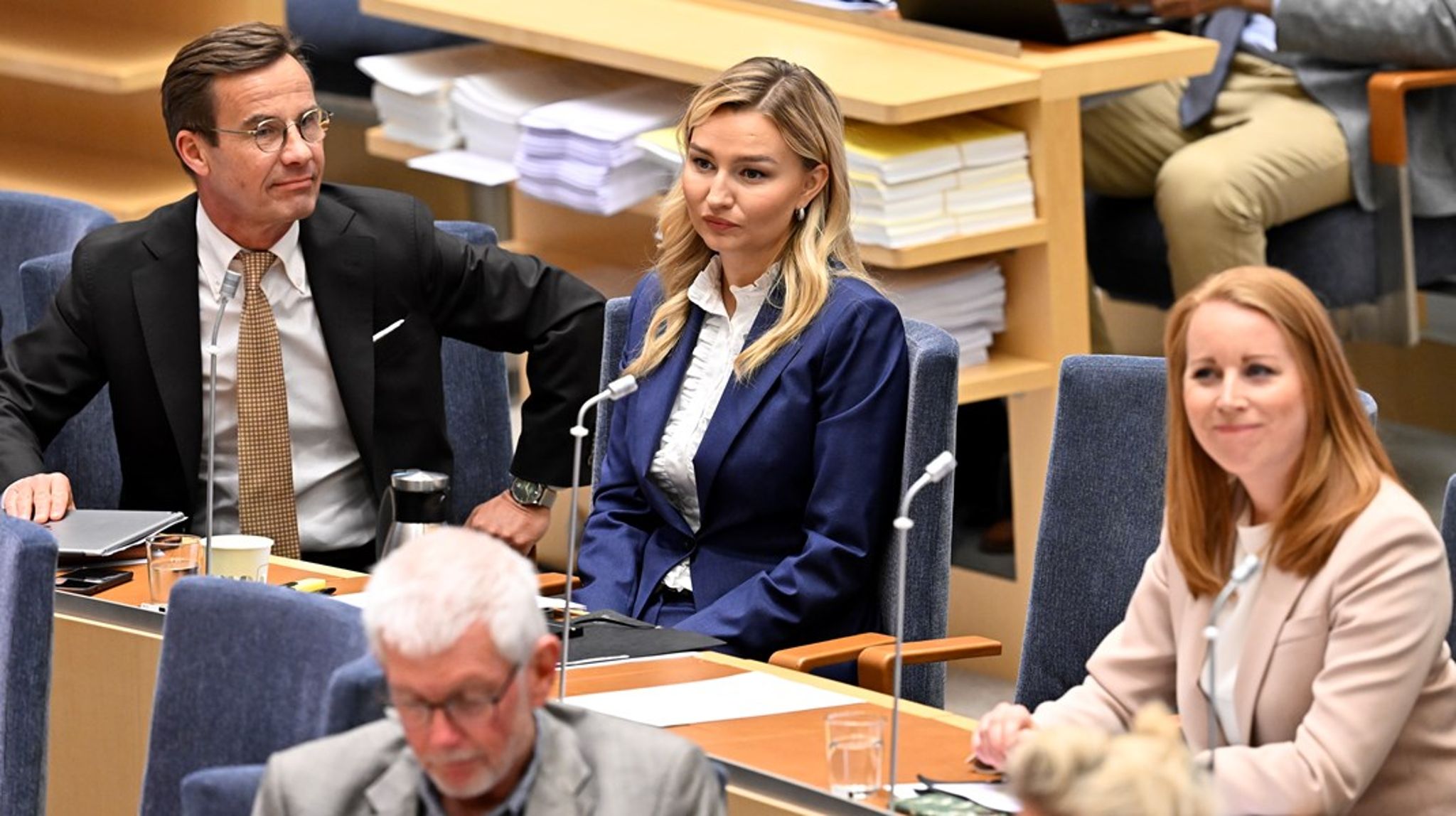 M-partiledaren Ulf Kristersson, Kristdemokraternas partiledare Ebba Busch och Centerpartiets partiledare Annie Lööf under dagens partiledardebatt i riksdagen.